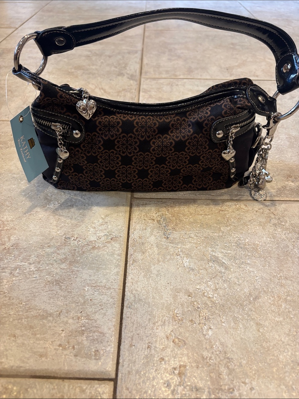 Kathy Van Zeeland Black and Brown Floral Pattern Shoulder Bag with Charm Accents